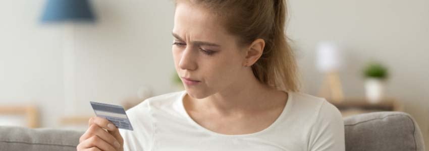 Female Holding Credit Card