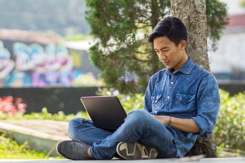 Student Sitting Tree